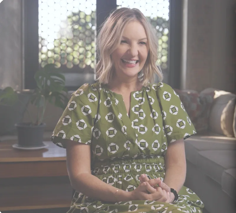 An interviewee seated in a bright living room